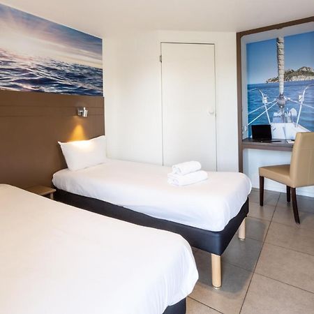 Hotel Confort Le Moulin Rouge Terrasson Bagian luar foto