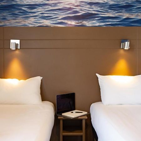 Hotel Confort Le Moulin Rouge Terrasson Bagian luar foto