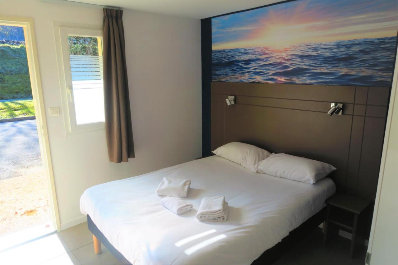 Hotel Confort Le Moulin Rouge Terrasson Bagian luar foto