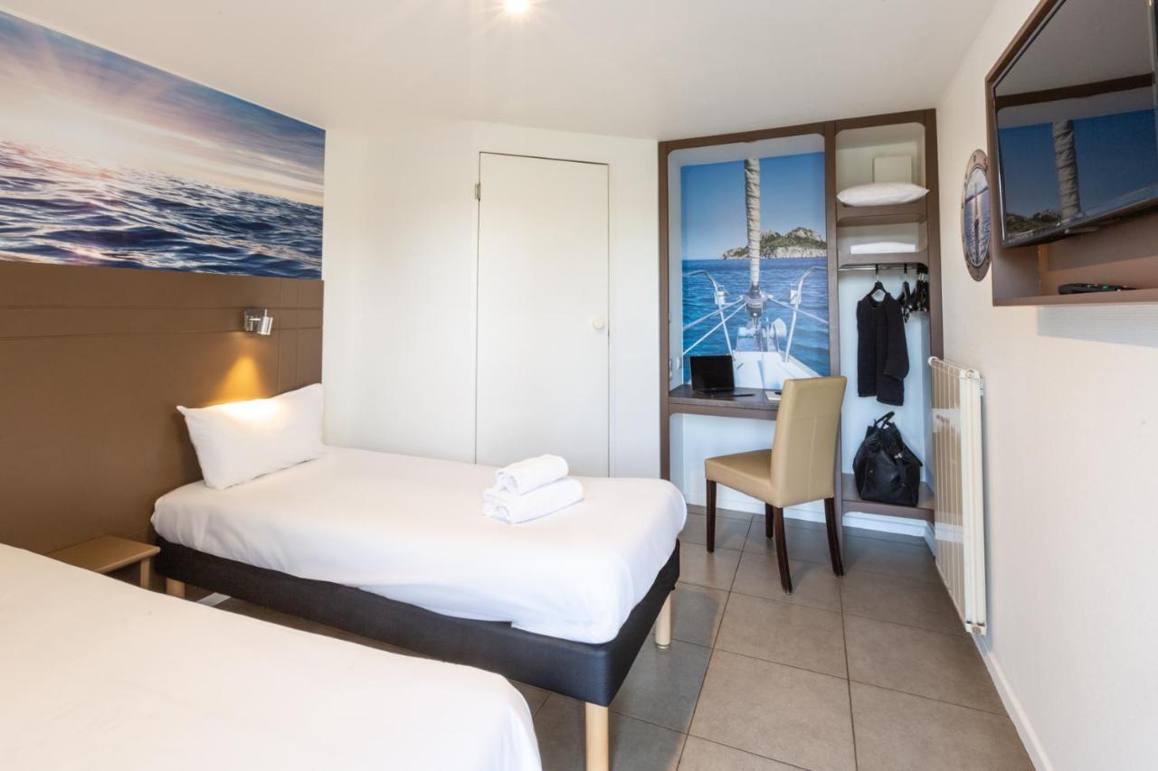 Hotel Confort Le Moulin Rouge Terrasson Bagian luar foto