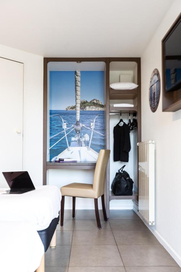 Hotel Confort Le Moulin Rouge Terrasson Bagian luar foto